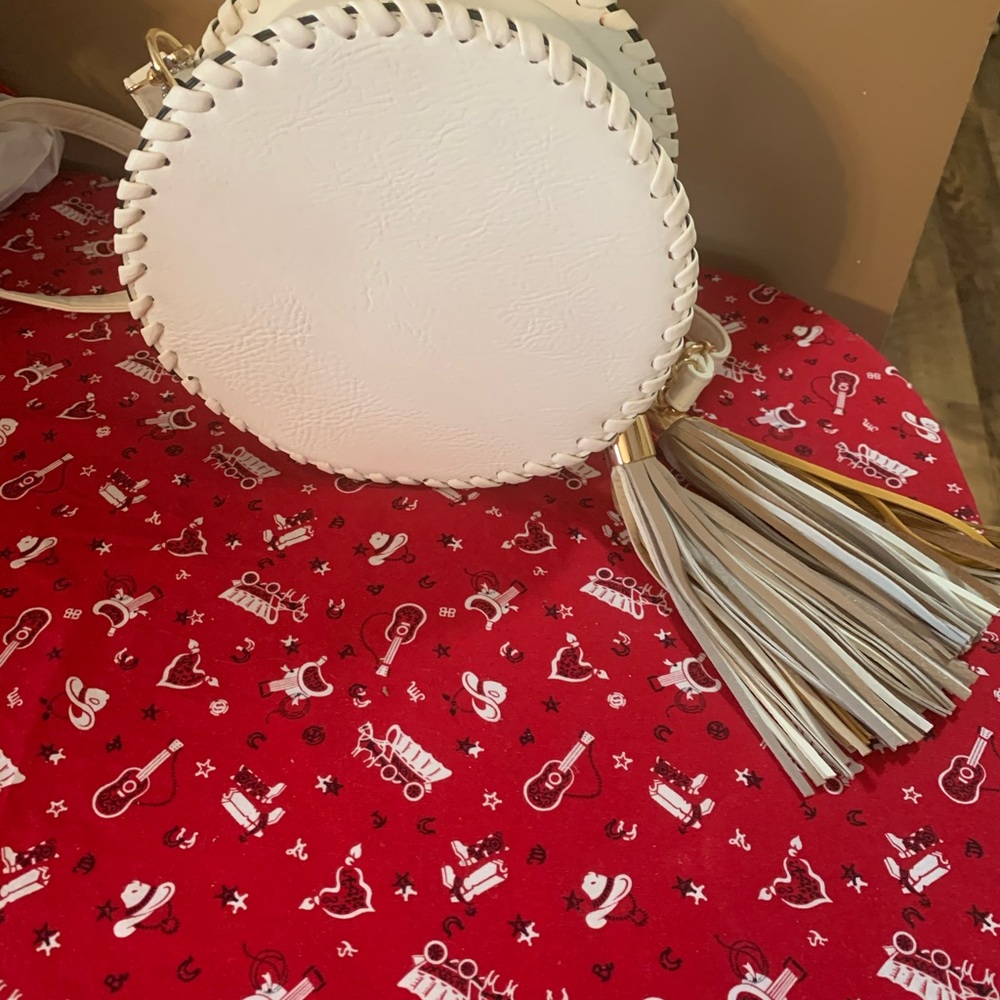 New drum fringe purse